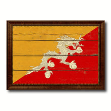 Load image into Gallery viewer, Bhutan Country Flag Vintage Canvas Print with Brown Picture Frame Home Decor Gifts Wall Art Decoration Artwork